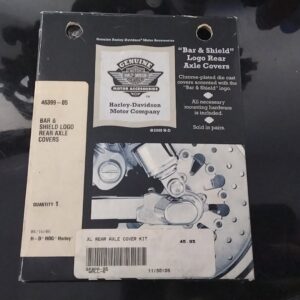 RWHQ250049 - Genuine Harley Davidson Motor Accesories 46399-05. Bar and shield Rear Axle covers.
